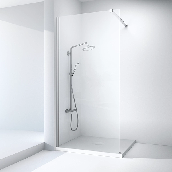 frameless walk-in shower enclosure in the white bathroom