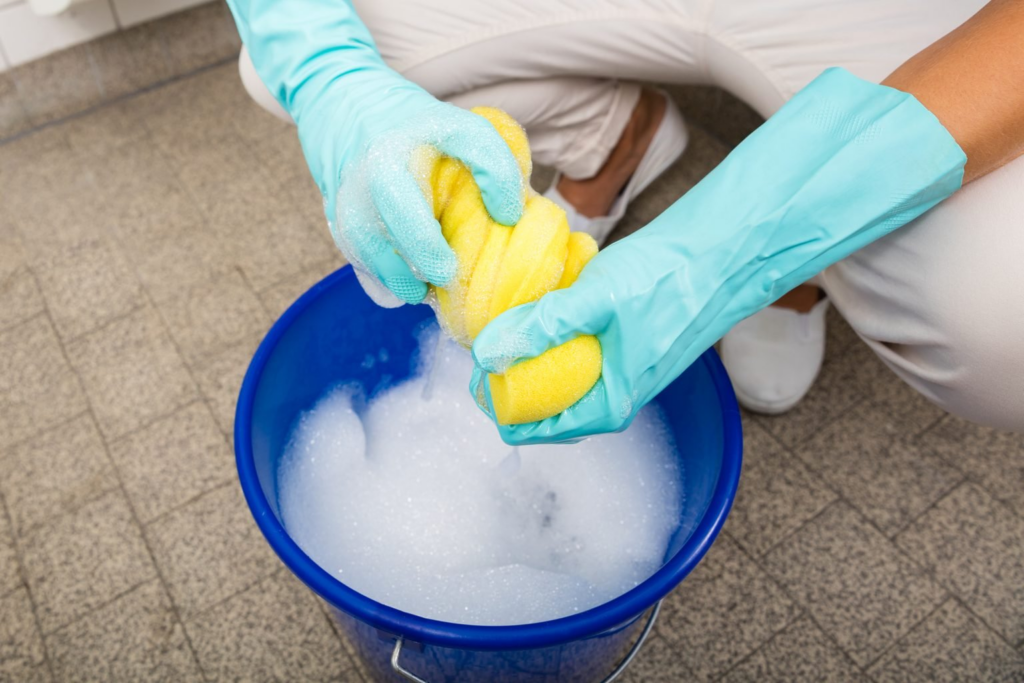 a people washing the sponge